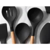 Knivset med knivblock, köksredskap och skärbräda