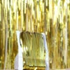 Metallic guld glitterdraperi för fest födelsedag