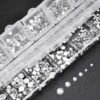 2000 rhinestone nageldekorationer kristall - olika storlekar i ask