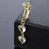 Fake navelpiercing clip-on navelring utan hål hjärta kristall guld